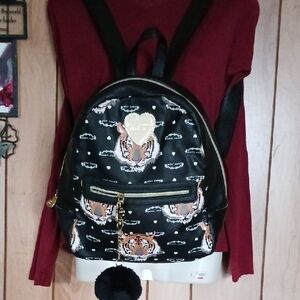 Betsey Johnson Black Tiger Print Faux Leather Backpack with Pom Pom
